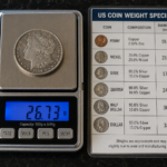 "Coin weight and diameter specifications chart with US coins on a jeweler's scale in Las Vegas